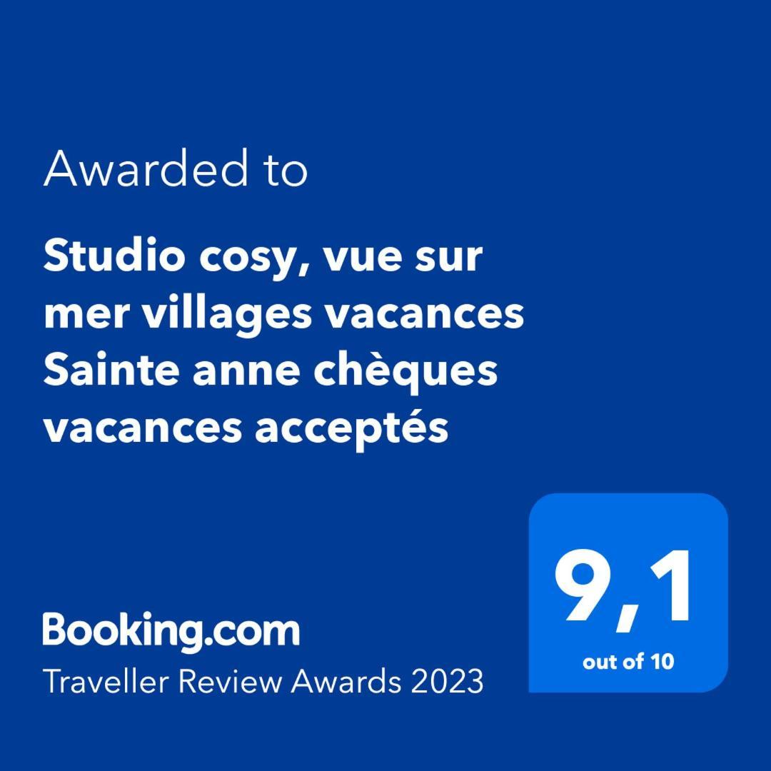 Studio cosy, vue sur mer villages vacances Sainte anne chèques vacances acceptés Camera foto